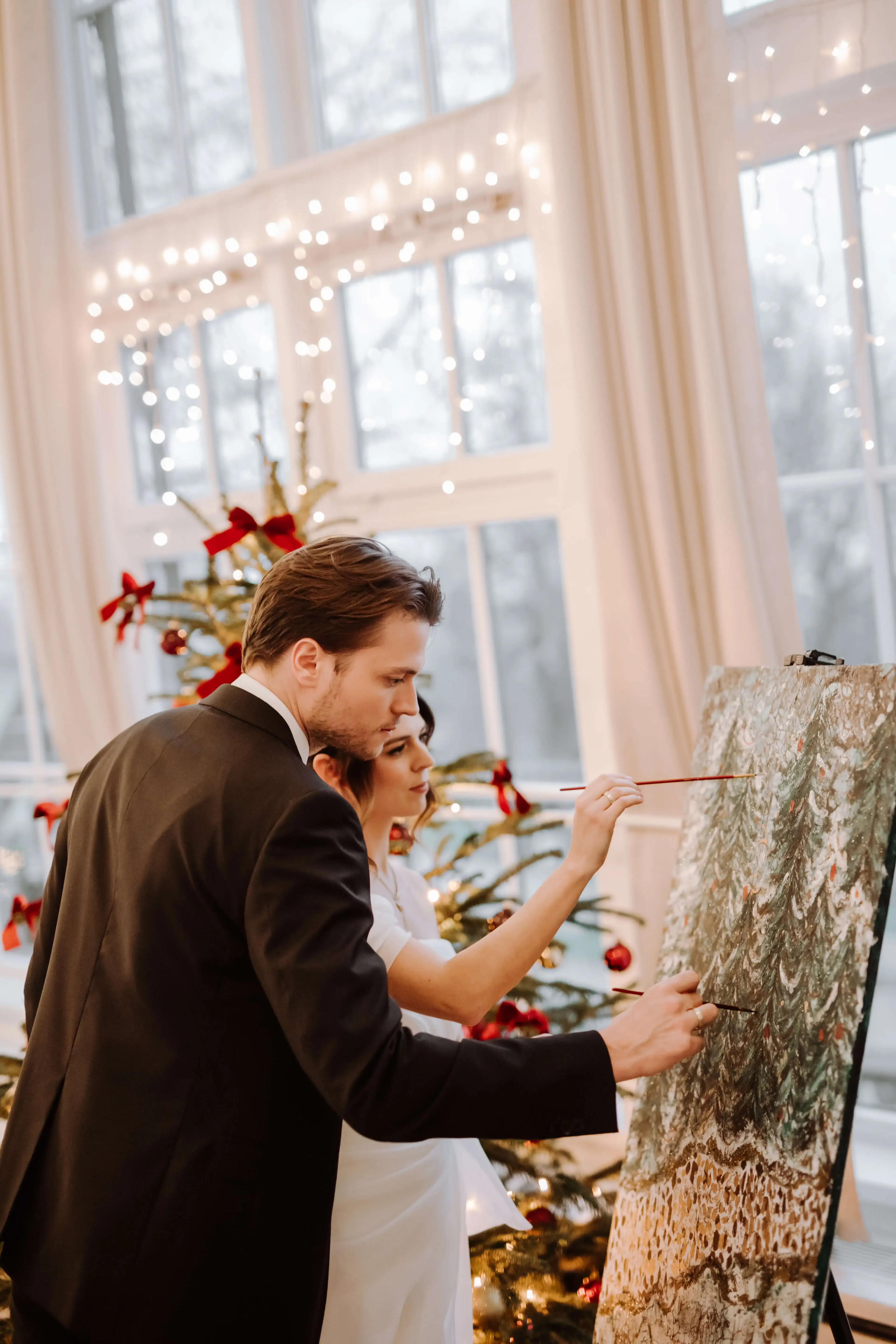 Live-Painting Entstehung bei winterlicher Hochzeitsfeier